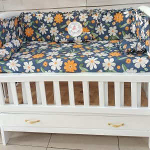 Baby cot bumper with bedsheet